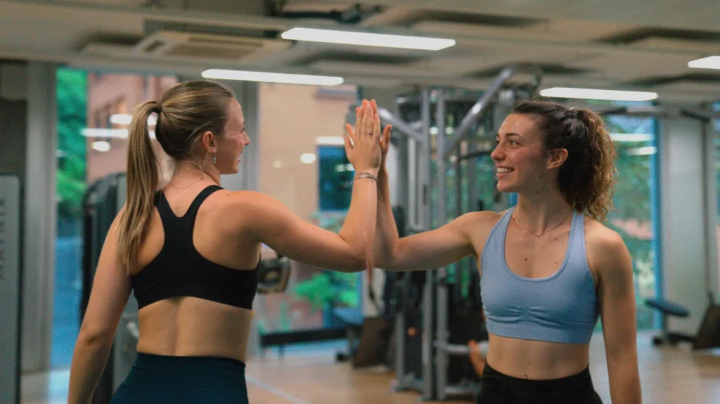 high five coach and trainee